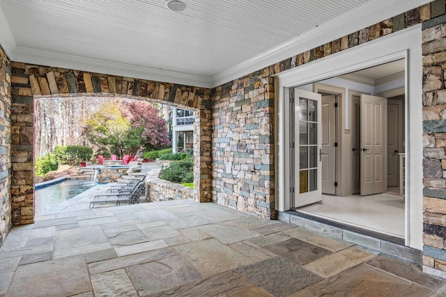 view of patio / terrace with an outdoor pool