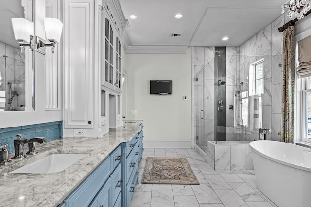 full bathroom with visible vents, a stall shower, a freestanding tub, marble finish floor, and vanity