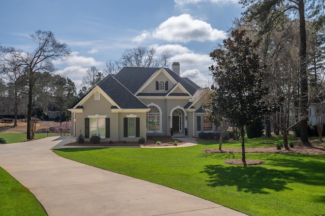 craftsman inspired home with a front yard