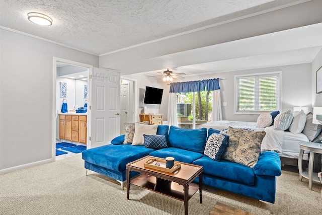 living room with crown molding, a textured ceiling, and carpet flooring