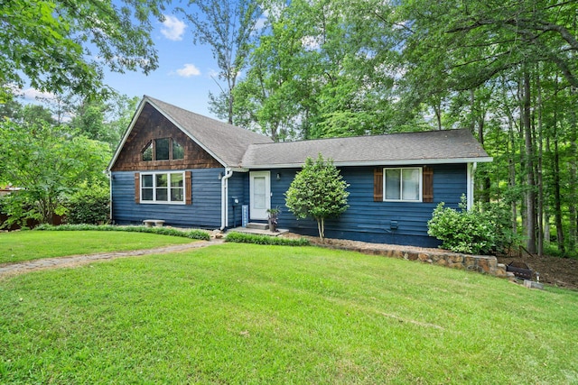 single story home with a front yard