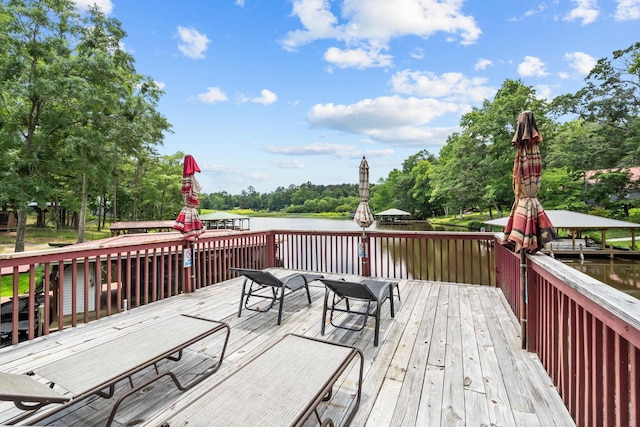 wooden terrace with a water view