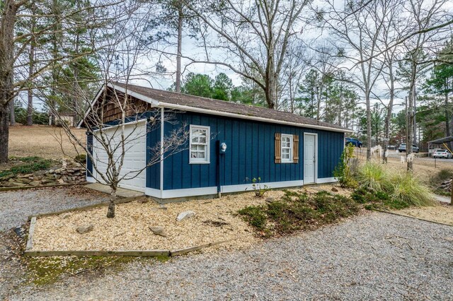 view of outbuilding featuring a garage