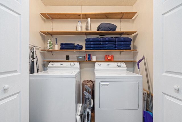 laundry room with separate washer and dryer