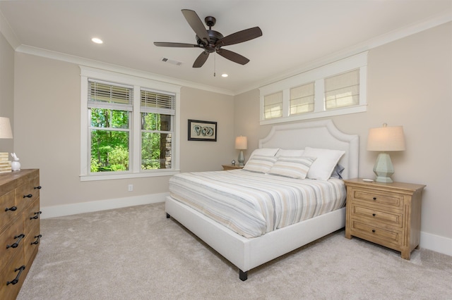 bedroom featuring crown molding, light colored carpet, baseboards, recessed lighting, and ceiling fan