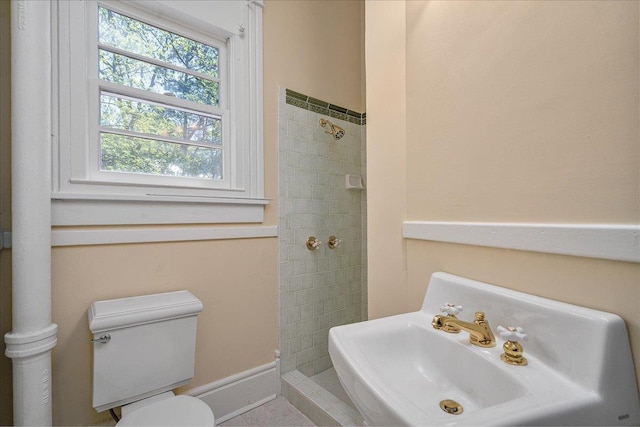 bathroom featuring sink and toilet