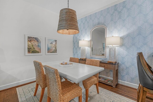 dining space featuring light wood-type flooring