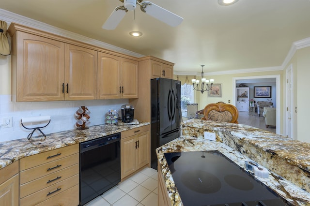 kitchen featuring ornamental molding, light tile patterned floors, light stone counters, and black appliances