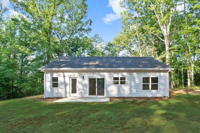 103 Spruce Ln, Eatonton, GA 31024 - rear view of house with a patio area and a lawn