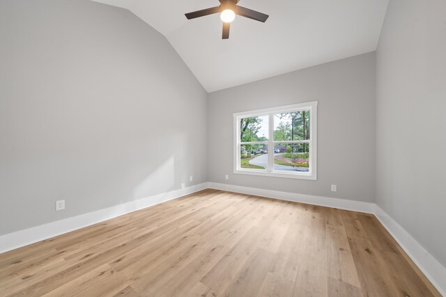 103 Spruce Ln, Eatonton, GA 31024 - empty room featuring ceiling fan, lofted ceiling, light wood-type flooring, and baseboards