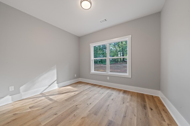 103 Spruce Ln, Eatonton, GA 31024 - unfurnished room with wood finished floors and baseboards