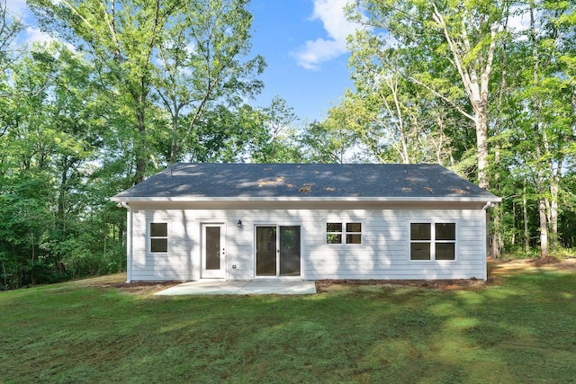 103 Spruce Ln, Eatonton, GA 31024 - rear view of house with a patio and a lawn