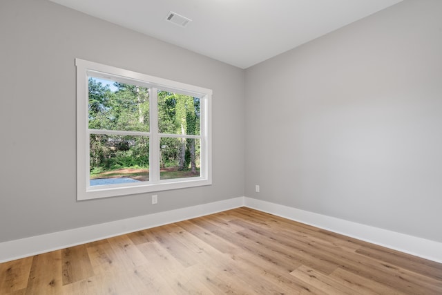 103 Spruce Ln, Eatonton, GA 31024 - spare room featuring baseboards and light wood-style floors