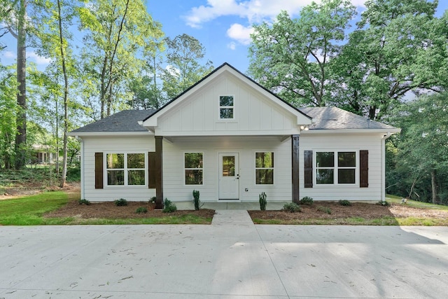 103 Spruce Ln, Eatonton, GA 31024 - view of front of home with board and batten siding