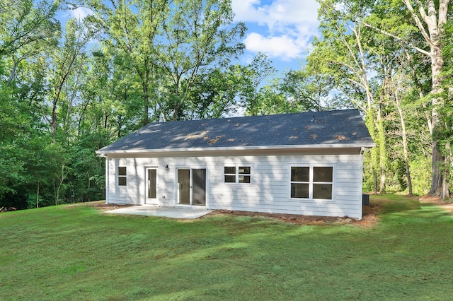 103 Spruce Ln, Eatonton, GA 31024 - rear view of property featuring a patio and a lawn