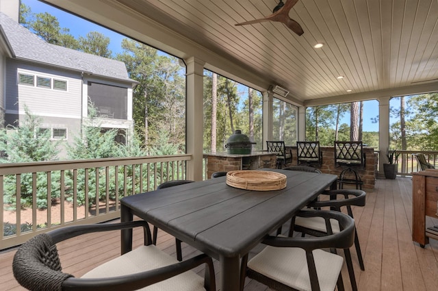 sunroom / solarium with ceiling fan and wooden ceiling