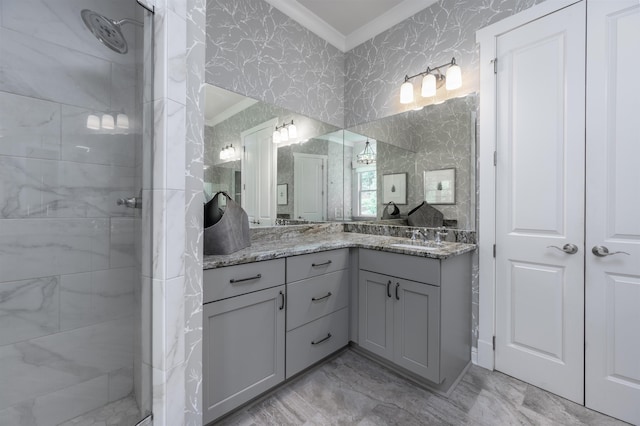 bathroom featuring vanity and ornamental molding