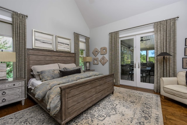 bedroom with dark hardwood / wood-style floors, access to outside, high vaulted ceiling, and french doors