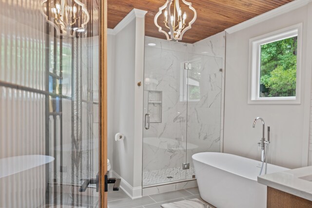 291 Power Point Rd, Milledgeville, GA 31061 - bathroom with a chandelier, a freestanding bath, a marble finish shower, crown molding, and wooden ceiling