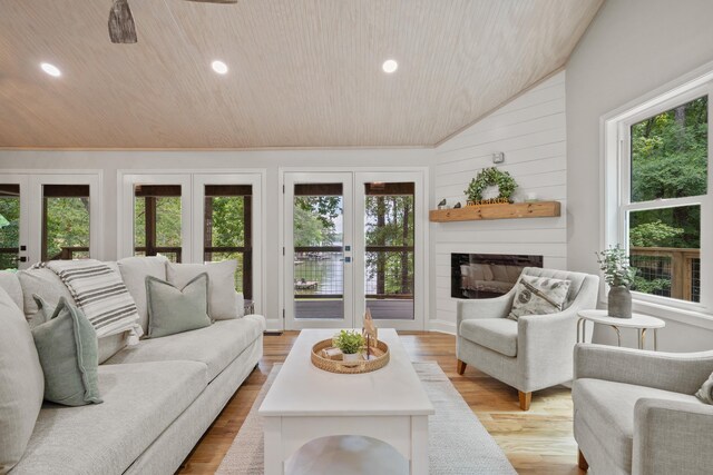 291 Power Point Rd, Milledgeville, GA 31061 - living room featuring wood ceiling, vaulted ceiling, french doors, healthy amount of natural light, and a fireplace