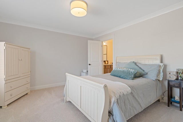 bedroom featuring crown molding and light carpet