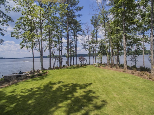 view of yard with a water view