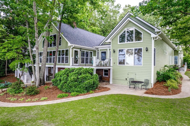 165 Lakeview Dr, Eatonton, GA 31024 - rear view of property featuring stairway, a lawn, a chimney, and roof with shingles