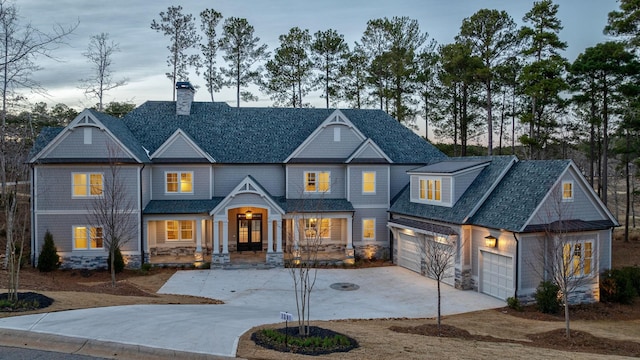 craftsman house featuring a garage