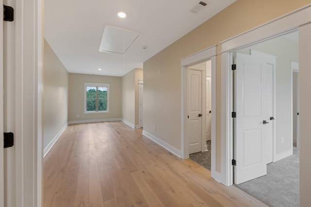 1201 Askew Trl, Greensboro, GA 30642 - corridor with baseboards, attic access, light wood-type flooring, and visible vents