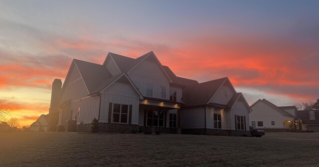 1201 Askew Trl, Greensboro, GA 30642 - view of front of property with board and batten siding and a chimney