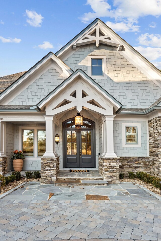 property entrance featuring french doors