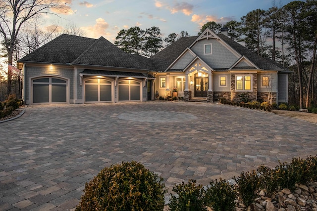 craftsman-style home featuring a garage