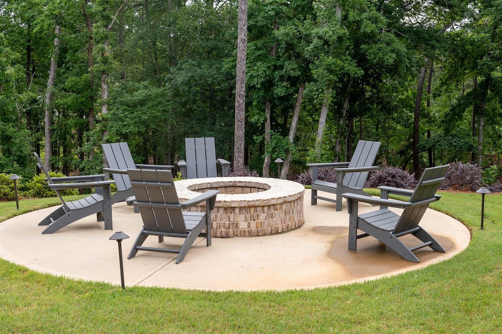 view of patio / terrace featuring a fire pit