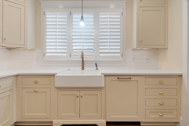 kitchen with plenty of natural light, sink, and decorative backsplash