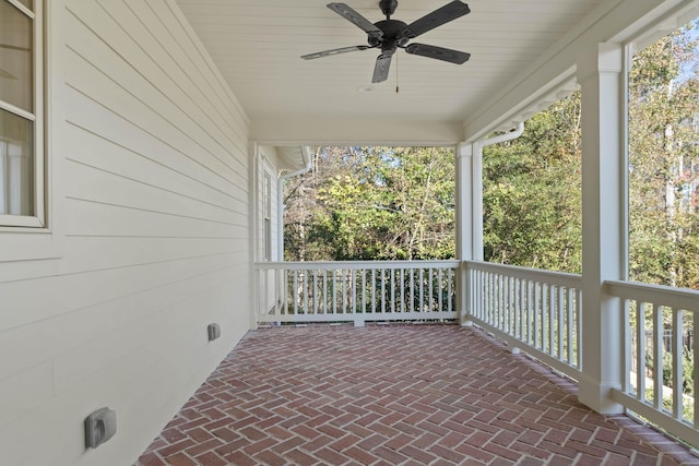 view of patio / terrace with ceiling fan and a porch