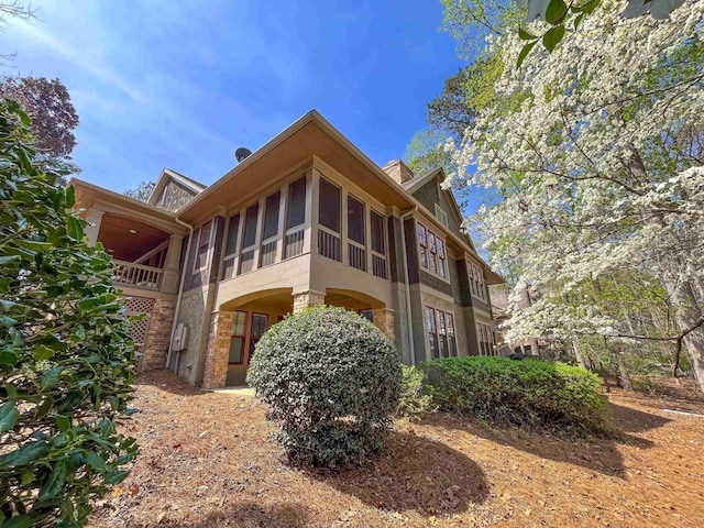 1031 Lockets Trl, Greensboro, GA 30642 - view of property exterior with a chimney
