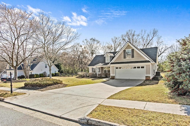 view of front facade with concrete driveway, a front lawn, and central AC unit