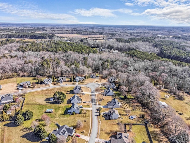 aerial view featuring a view of trees