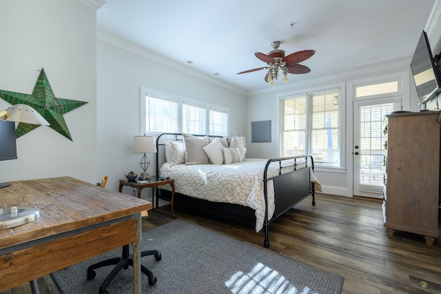 bedroom with dark wood-type flooring, ornamental molding, and ceiling fan