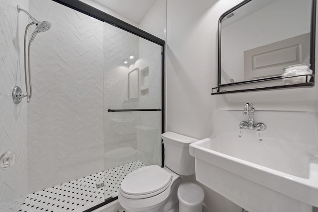 113 Daisy Trl, Milledgeville, GA 31061 - full bath with a stall shower, toilet, and a sink