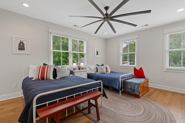 113 Daisy Trl, Milledgeville, GA 31061 - bedroom with recessed lighting, visible vents, baseboards, and light wood-style floors