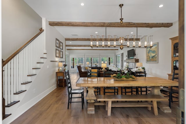 113 Daisy Trl, Milledgeville, GA 31061 - dining room with beam ceiling, stairway, wood finished floors, and recessed lighting