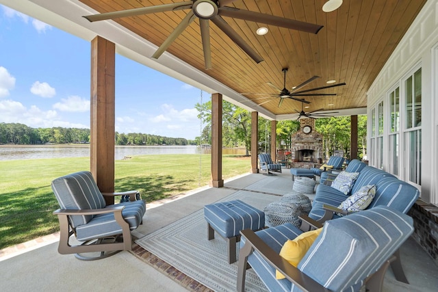 113 Daisy Trl, Milledgeville, GA 31061 - view of patio with a water view, ceiling fan, and an outdoor brick fireplace