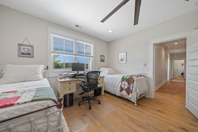 113 Daisy Trl, Milledgeville, GA 31061 - bedroom featuring visible vents, attic access, light wood-style flooring, and recessed lighting
