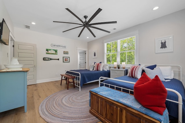 113 Daisy Trl, Milledgeville, GA 31061 - bedroom with wood finished floors, visible vents, and recessed lighting