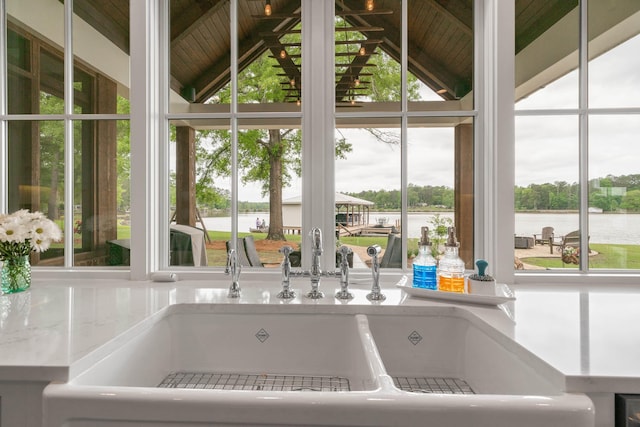 113 Daisy Trl, Milledgeville, GA 31061 - details with light countertops, a water view, and a sink