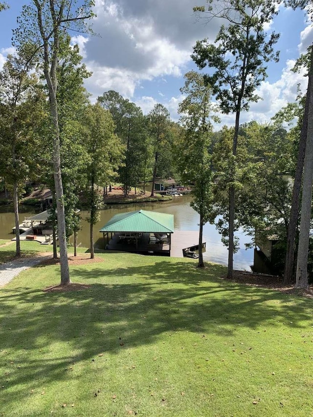 view of property's community featuring a gazebo, a yard, and a water view