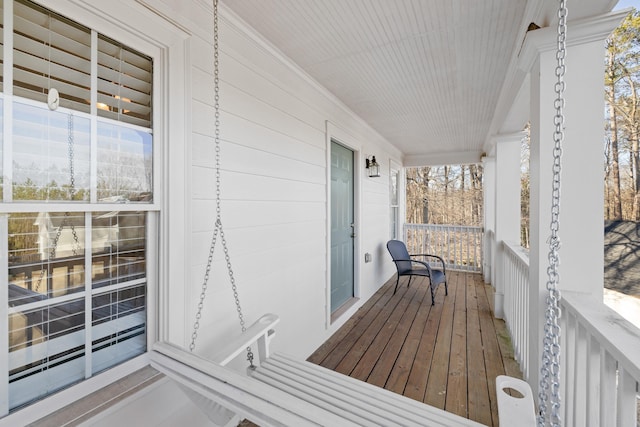balcony featuring a porch