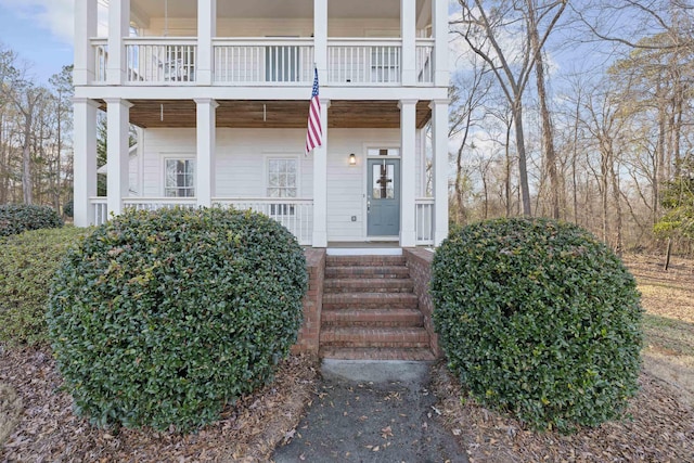doorway to property with a balcony