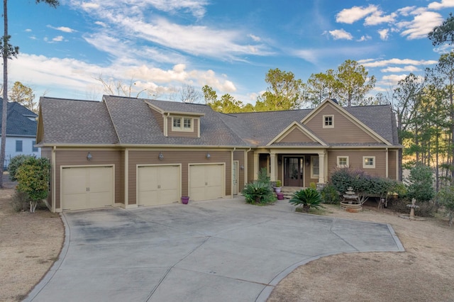 view of front of property with a garage